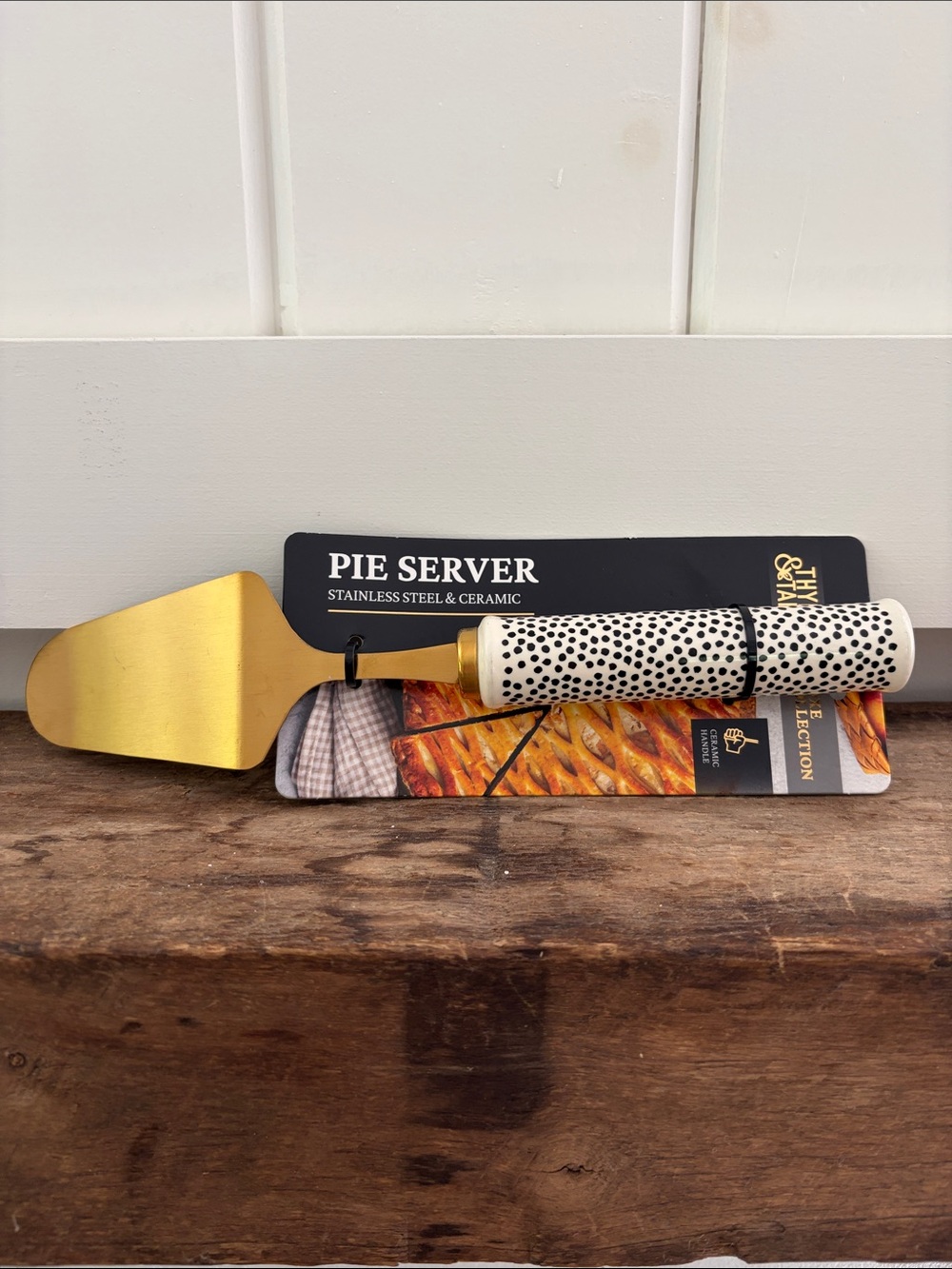 Gold Pie Server with White and Black Speckled Handle